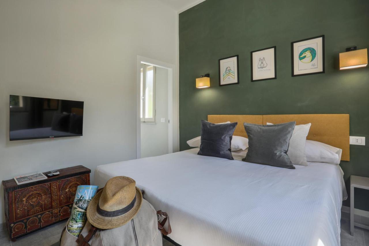I Levrieri Hotel ตอร์เร เดล ลาโกปุชชีนี ภายนอก รูปภาพ